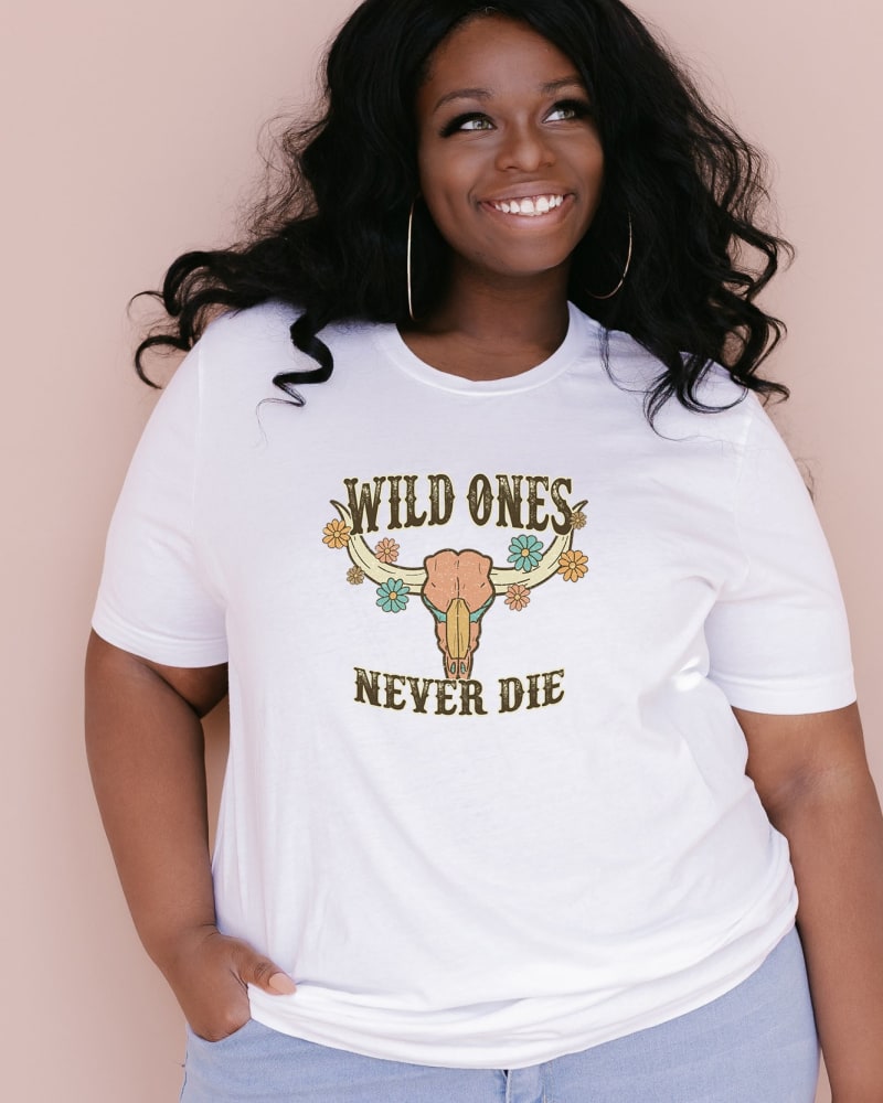 Front of a model wearing a size Large Wild Ones Never Die in White by Simply Sage Market. | dia_product_style_image_id:281467